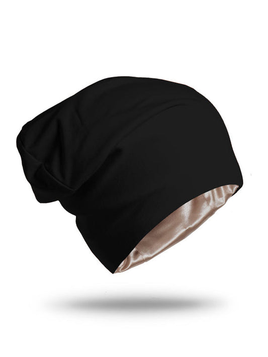 black beanie sleeping cap that is lined in satin for sleeping or winter